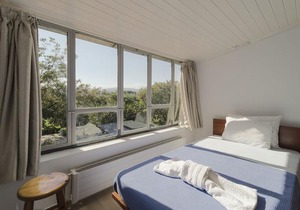 Holiday home next to orange tree orchard