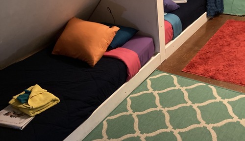 Single mixed dorm loft area, shared bathroom, Inn location, not pet friendly