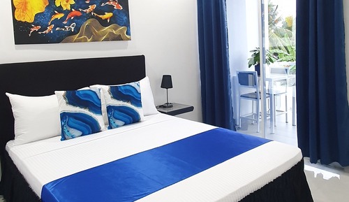 Deluxe Room, 1 Queen Bed, Balcony, Pool View