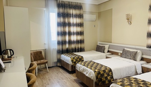 Grand Triple Room