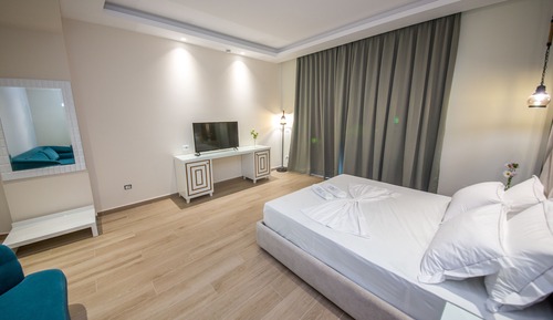 Deluxe Triple Room, Balcony, Partial Sea View