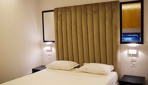 Superior triple room with one double bed and one single bed