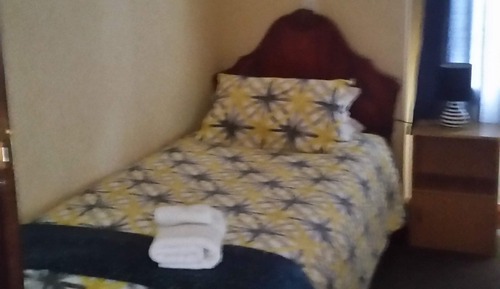Single Bed Room with Shared Bathroom Facilities	