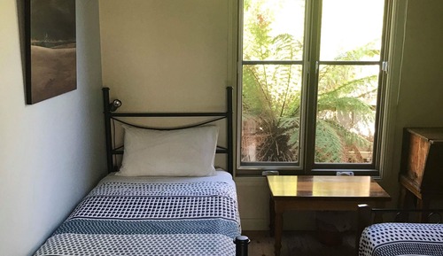 Basic Triple Room with Shared Bathroomg (in a Guest House)