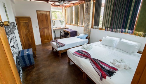 Deluxe Triple Room, 1 Bedroom, Private Bathroom, Partial Ocean View