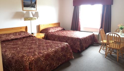 Room Two queen beds with kitchenette