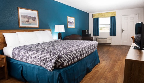 Basic Single Room, 1 King Bed with Sofa bed, Non Smoking