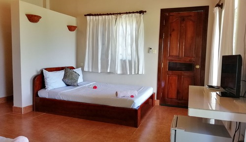 Deluxe Quadruple Room, 2 Double Beds, Garden View