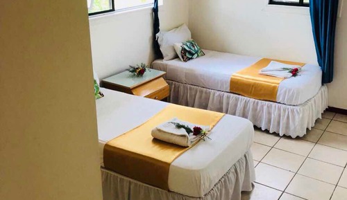 Economy Twin Room, 2 Twin Beds, Shared Bathroom