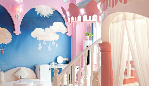 A pink dreamland (enchanted carousel + fun slide + 2 round beds measuring 2 meters)