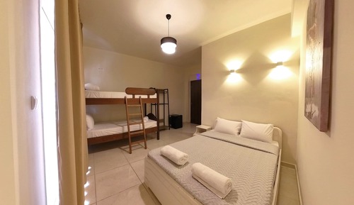 Economy Quadruple Room, Balcony, City View