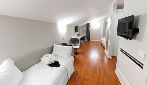 Deluxe Quadruple Room, Balcony, Courtyard View