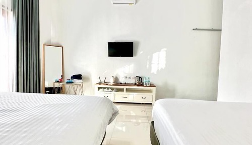 Deluxe Quadruple Room, Courtyard View