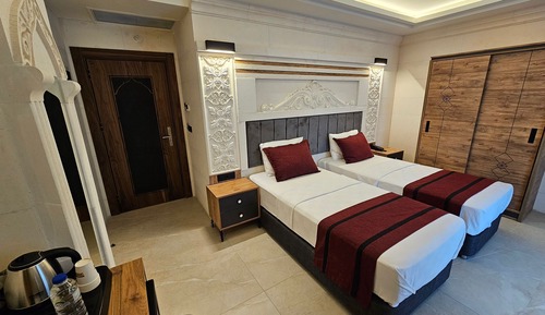 Deluxe Quadruple Room, City View