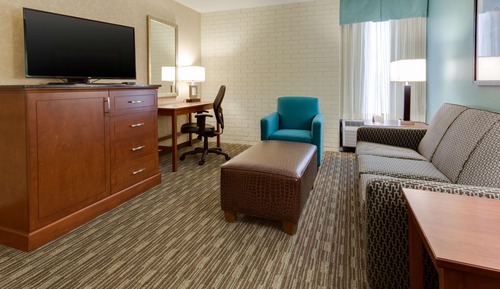 Suite, Refrigerator & Microwave (2 Queen Beds and Sofa Bed)