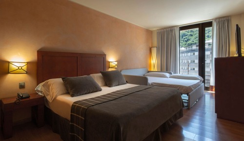 Quadruple Room (3 Adults + 1 Child)
