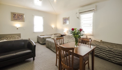 Family Room (1 Queen, 2 Large Single Beds)