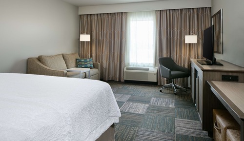 Room, 1 King Bed with Sofa bed, Refrigerator & Microwave