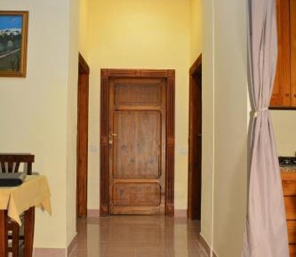 Four-Bedroom Apartment with Garden View