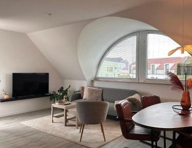 One-Bedroom Apartment with Balcony and City View