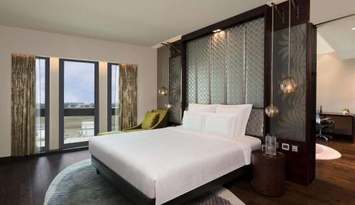 Superior Suite with 2 way airport transfers, Lounge access,15% discount on F&B services and laundry