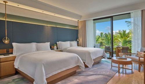Deluxe Queen Room with Two Queen Beds and Partial Ocean View/Balcony