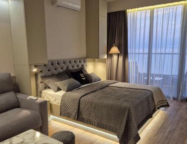 One-Bedroom Apartment with Balcony and Sea View