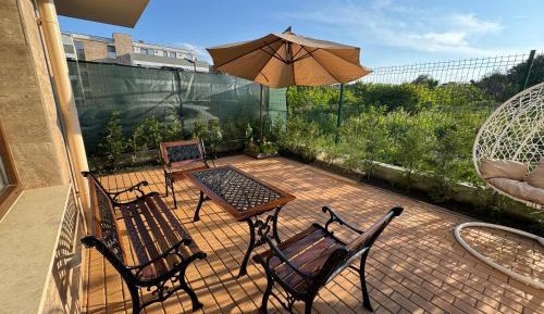 One-Bedroom Apartment with Garden