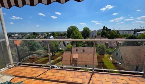 Four-Bedroom Apartment with Balcony 