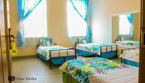 Single Bed in Dormitory Room