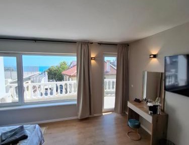 Three-Bedroom Apartment with Sea View