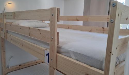 Single Bed in Dormitory Room