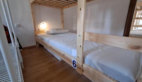 Single Bed in Dormitory Room
