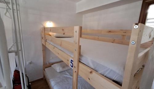 Single Bed in Dormitory Room