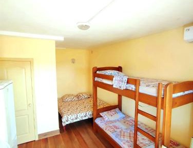 Quadruple Room with Private Bathroom