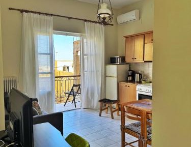 One-Bedroom Apartment with Balcony and City View