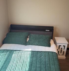 Queen Room with Shared Bathroom