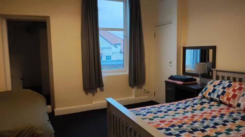 Basic Triple Room with Shared Bathroom