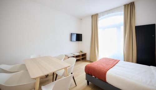 Three-Bedroom Apartment with Balcony