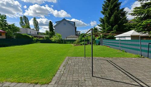 Apartment with Balcony and Garden Access