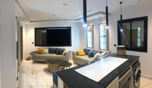 Three-Bedroom Apartment with Sea View