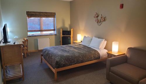1 Queen 1 Sleeper Sofa - Front Building