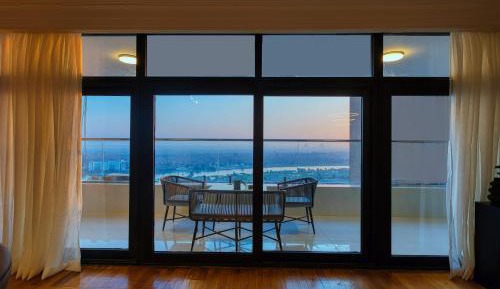 Four-Bedroom Apartment with Balcony 