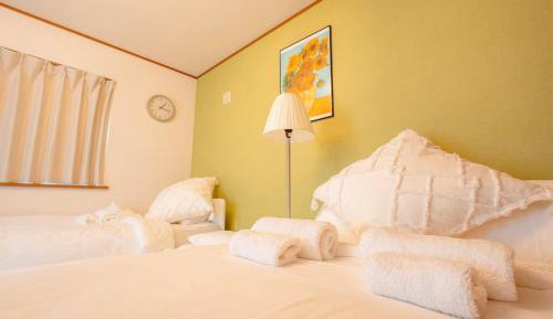 Four-Bedroom Apartment with Balcony 