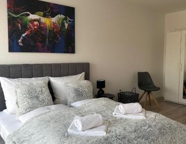 One-Bedroom Apartment with Balcony and City View