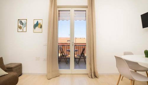 One-Bedroom Apartment with Balcony and Sea View