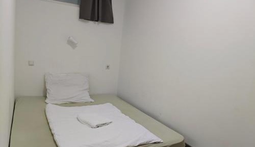 Four-Bedroom Apartment with Balcony 