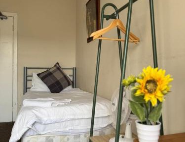 Single Room with Shared Bathroom