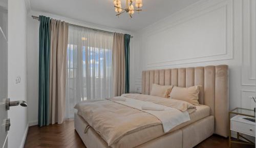 One-Bedroom Apartment with Balcony and City View