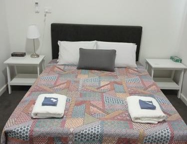 Queen Room with Shared Bathroom